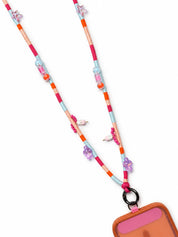 Capri handmade phone strap worn crossbody in fuchsia, peach and sky blue with flower and star beads