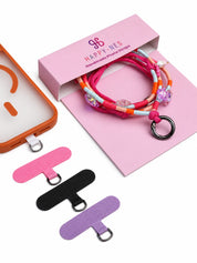Capri handmade phone strap coiled on the pink Happy-Nes gift box