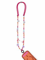 Close-up of the black O-ring and knot on the Capri phone strap with violet flower and ice cream beads