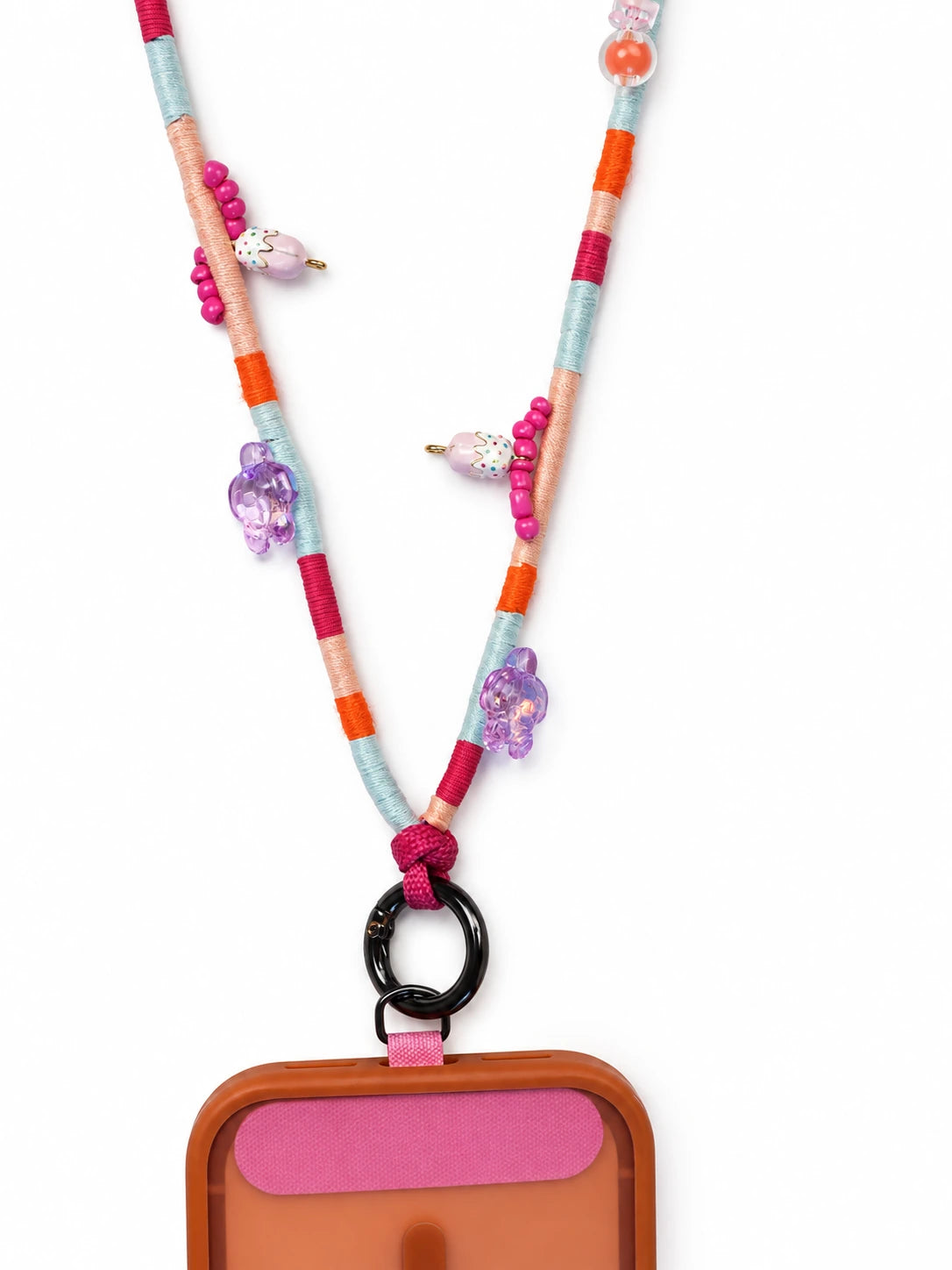 Bead detail on the Capri phone strap: iridescent stars, clear barrels and pink seed beads on wrapped cord