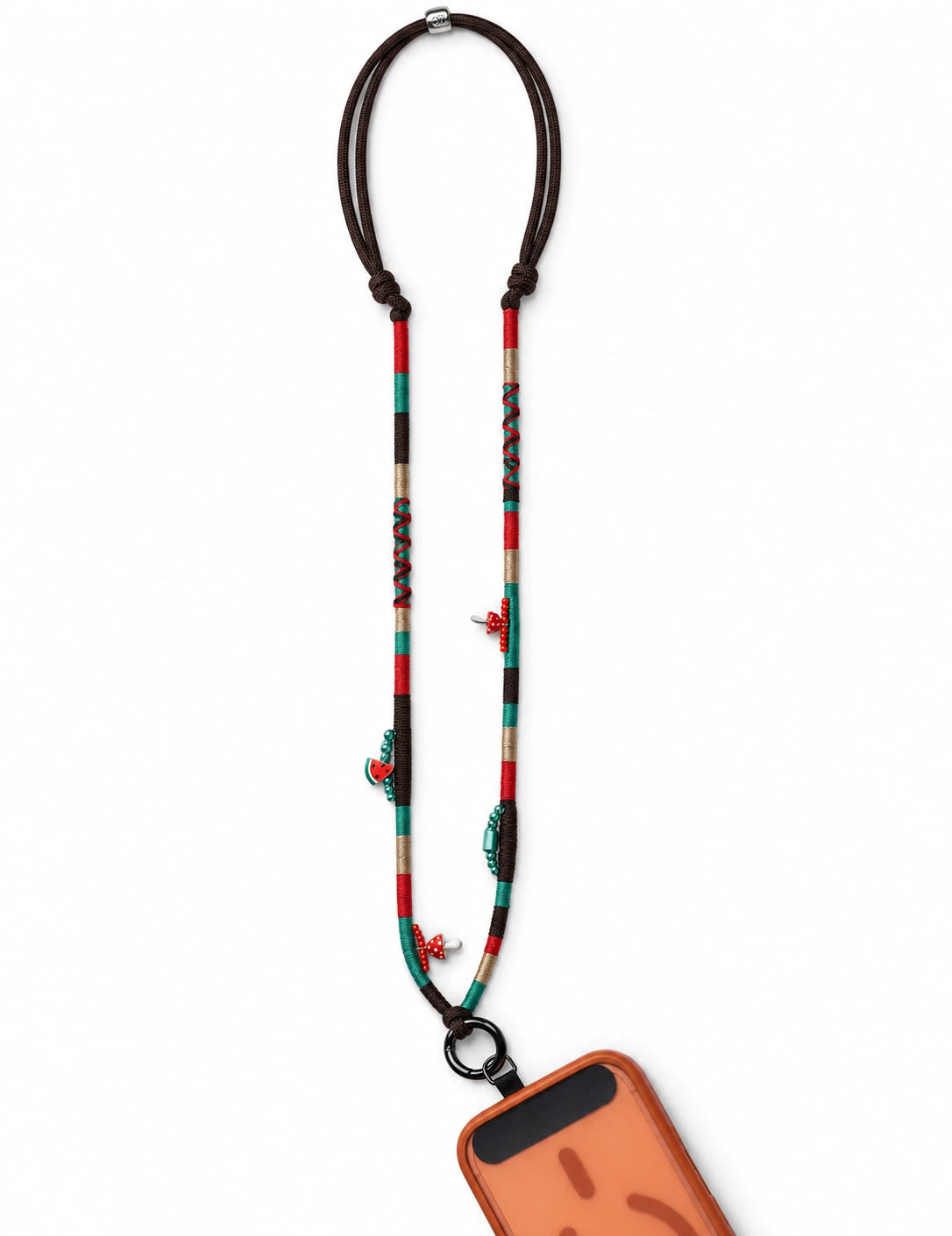 Marrakech handmade phone strap worn crossbody in brown, red, emerald and gold with mushroom beads