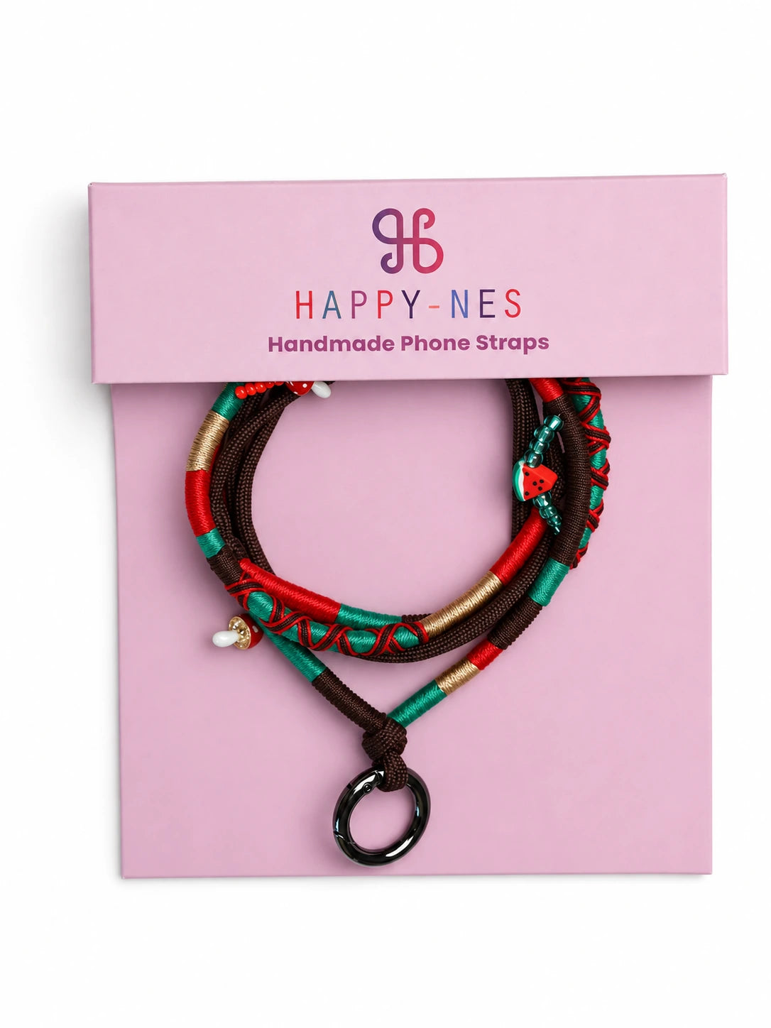 Marrakech handmade phone strap coiled on the pink Happy-Nes gift box