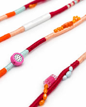 Valencia Beaded USB-C EarPods — handmade Apple USB-C earphones in red, orange, peach and ice blue with citrus, dragon fruit and leaf beads – photo 3